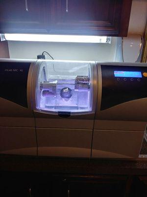 Cerec machine which mills all porcelain crowns the same day. No walking out with a temporary