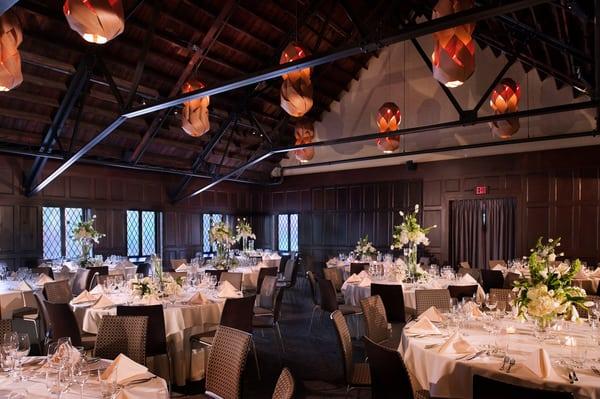 Gorgeous wood walls, lighting fixtures and beautiful windows.