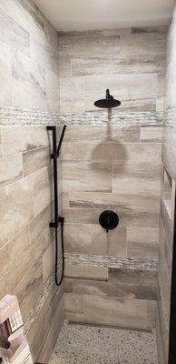 Custom tile shower in our bathroom design center.