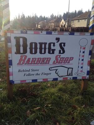 Doug's Barber Shop sign. Street view