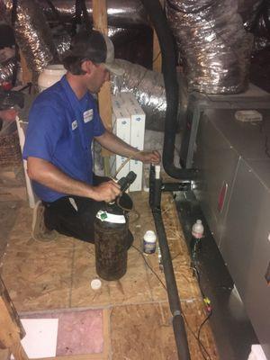 Classic Services air handler repair in attic.