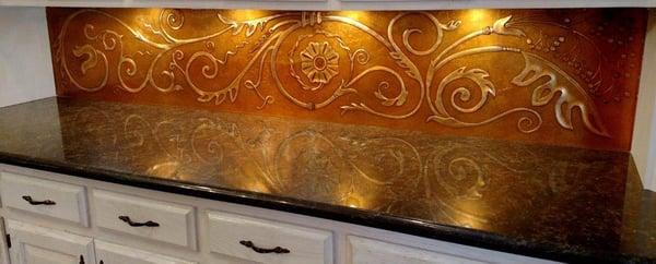 Hand Carved Glass Backsplash.