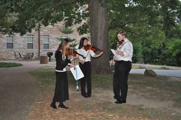 Students rehearsing outside on the Sewanee: University of the South Campus