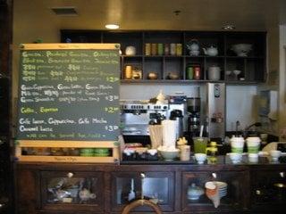 The back of the tea shop is modeled like a wine bar, but with tea and steaming machines instead.