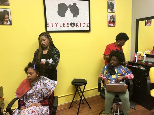 Styles 4 Kidz stylists doing their hair magic!