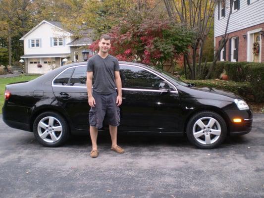 Tom Lynch, Syracuse, NY with his VW Jetta obtained through AutoWise.