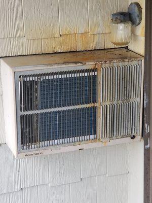 Outside of a/c unit which shows collected water