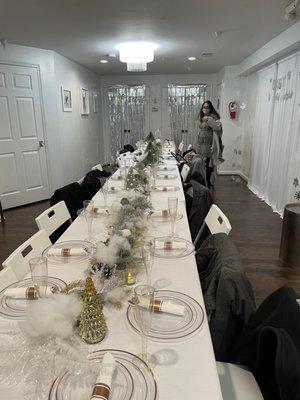 Winter Wonderland theme - 30th birthday party: Long dinner table setup