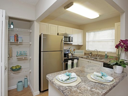 Updated kitchens with stainless steel appliances available.