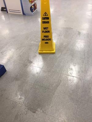 Wet floor... More like sticky floor