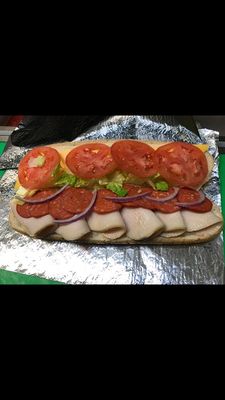 Cold sub turkey-pepperoni  cheese with lettuce, tomato, onion