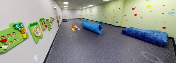 Gross Motor Room - This room is designed to help children play and practice both gross and fine motor skills.