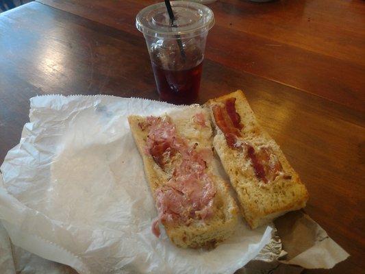 7.95 for sandwich, $1extra for baguette = $8.95, $4 for an ICE w/ coffee = Never eating there again PRICELESS.