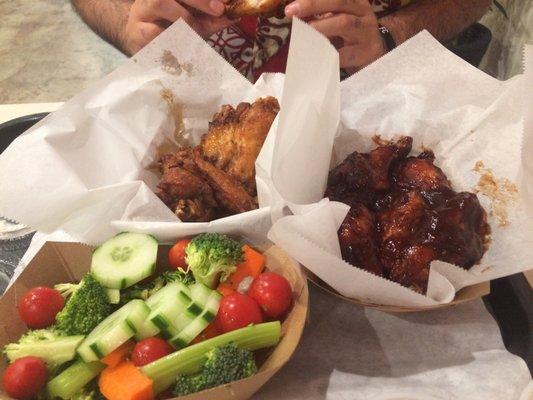 5 show bam wings and 5 spicy bbq with a yummy side of veggies