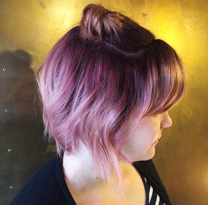 Pink hair with a dark purple color melt.