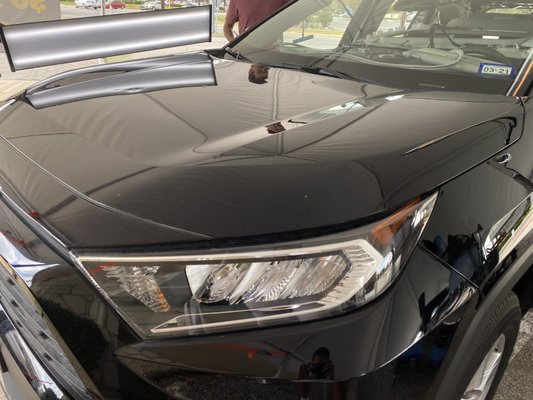 Toyota RAV4 hood damage.