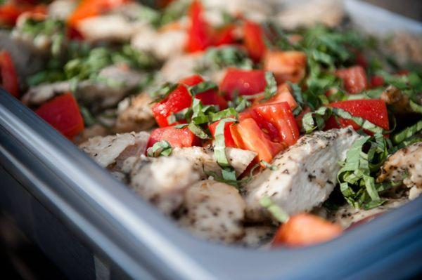 BASIL CHICKEN Sautéed breast of chicken with Roma tomatoes, fresh basil & garlic in a white wine butter sauce