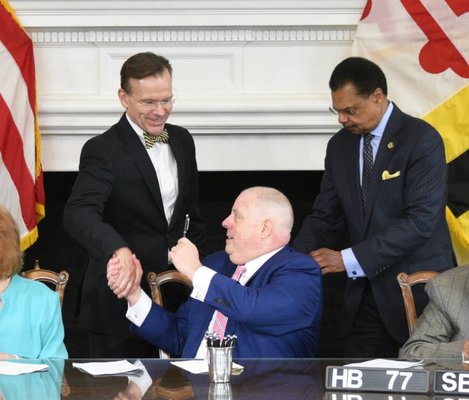 Nicholas D. Cowie Shaking Hands with Governor Hogan at Bill signing ceremony