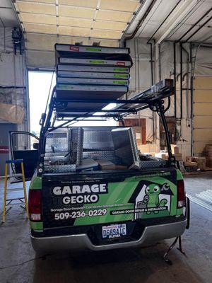 Garage Gecko truck loading up new garage doors to install.