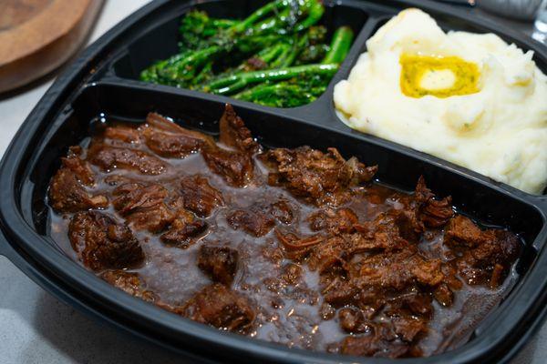 Savor perfection: Tender roast beef, garlic-infused mashed potatoes, and crisp broccolini unite in a symphony of flavors on your plate.