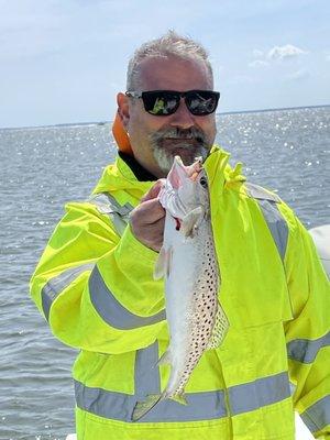 Daniel with his keeper trout