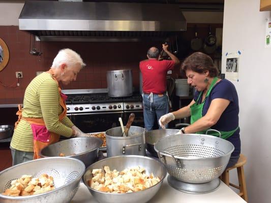 Potato vegetable soup being stirred. Croutons in process. Merrill, Carol, Ellen.