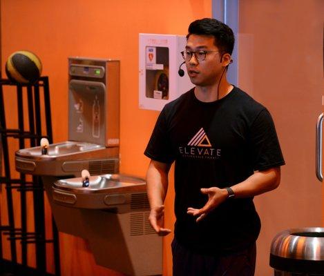 Dr. Park speaking at a runner's workshop