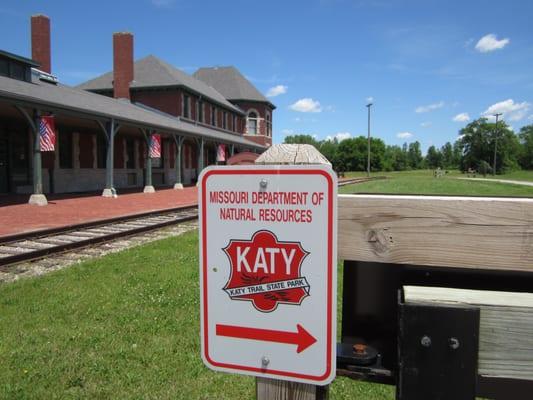 sign and exterior at one end of the much larger building