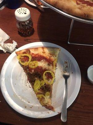 Large pizza slice of sausage and banana pepper- big slice!