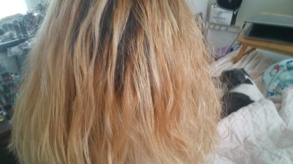 The yellow stripey disaster that is my hair.  They did this to me.  I had virgin, dark brown hair before i went here.