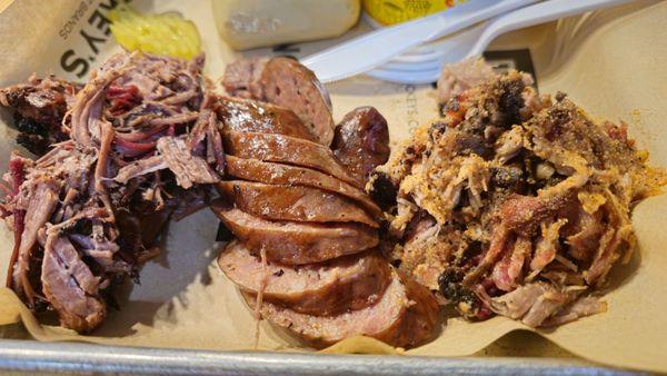 Chopped brisket, sausages and pulled pork.