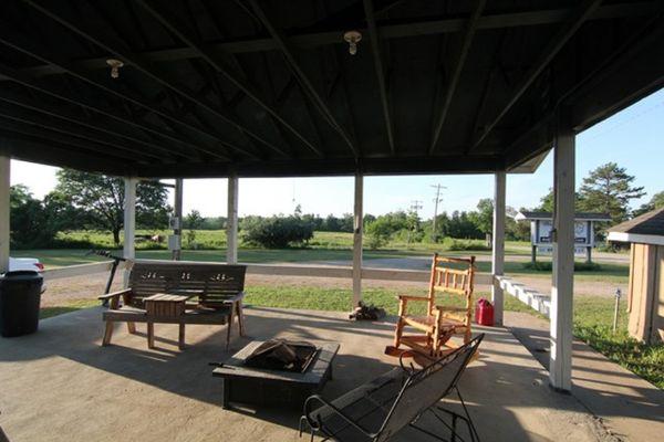 This is the pavilion adjacent to the inn, where guests can relax and grill. There is also a fire pit under the pavilion to use.