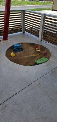 Play area in outdoor seating area.