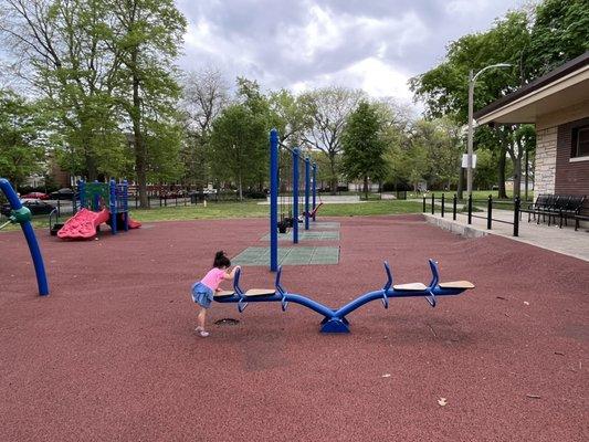 See saw, swings (including an accessible one, 2 baby ones, and 2 big kid swings)