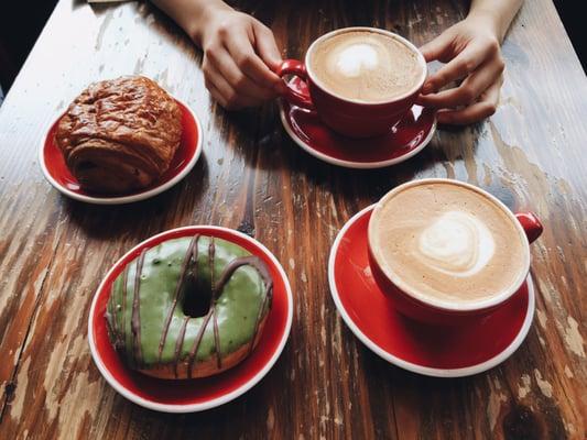 Matcha chocolate donut, chocolate croissant and lattes