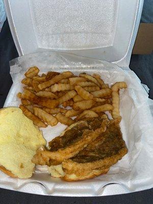 Dry unflavored fish sandwich with oily ass fries