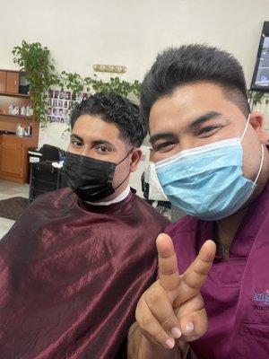 My brother and I getting an amazing haircut.