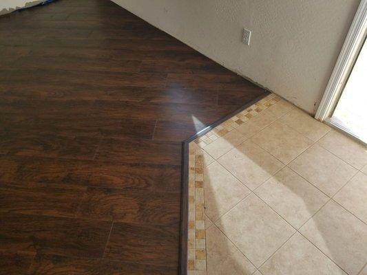 Finished Floating floor and porcelain entryway