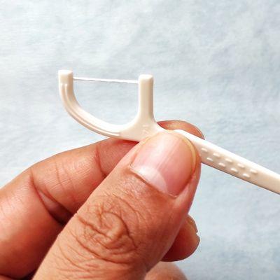 Floss picks accomplish the same basic task as dental floss: removing food from between teeth. Floss picks are also easier to use.