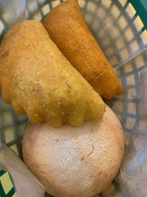 Beef/chicken empanadas and the round lighter one is the pandebono yuca