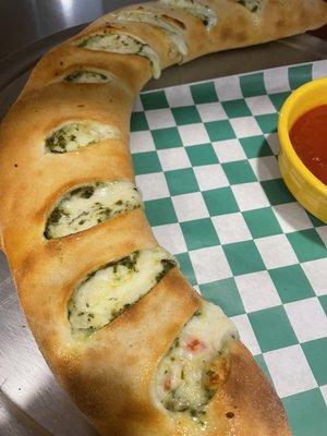 Pesto sausage calzone