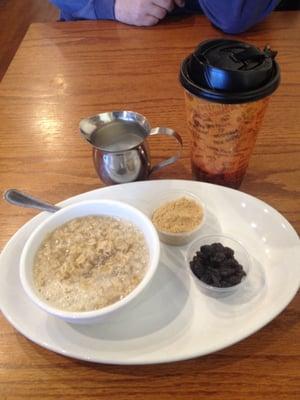 Oatmeal with two sides and milk.