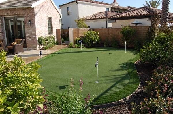 A backyard putting green featuring SGW products.