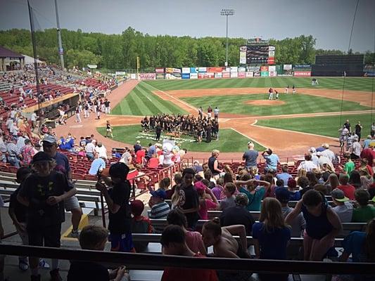 Residents enjoying a baseball game.