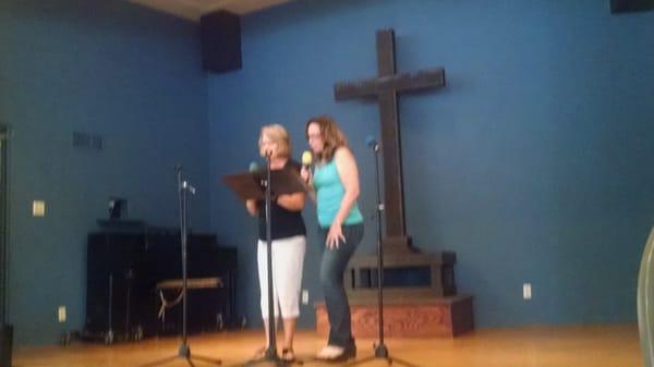 The entertainment at the church potluck--Debbie and Tracie.