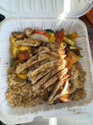 Grilled chicken breast with stir fry vegetables and garlic fried rice with egg