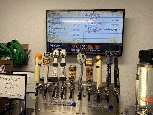 You get to fill up your own growler of beer from the taps here. How incredibly cool.