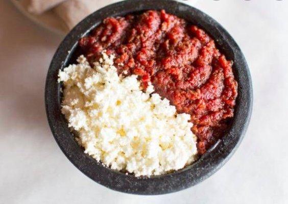 Steak tartare -seasoned with mitimita (spicy) & butter served with a side of  cottage cheese (Served rare, medium-rare, medium-well or wellD