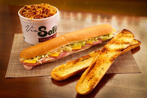 Sofia's Famous Family Feast is sure to please with 1/2 gallon spaghetti & Meat sauce, 16" gondola sub & 16" loaf of garlic bread