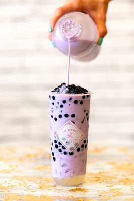 Taro milk tea with extra extra honey boba.